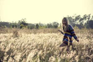 Young girl enjoying the meadows